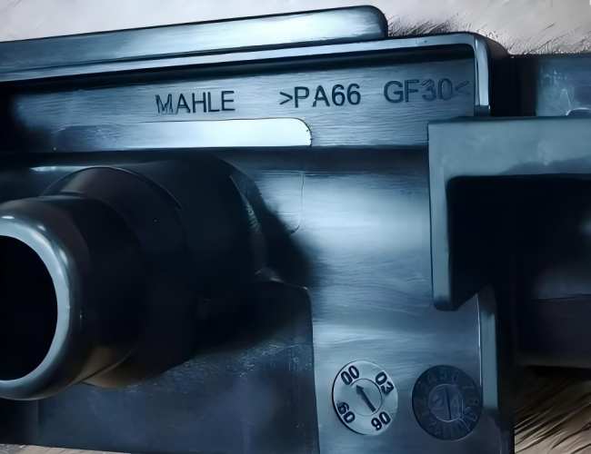 Mahle-Injection-molded-automotive-interior-trim-and-armrest-with-Class-A-leather-grain-surface
