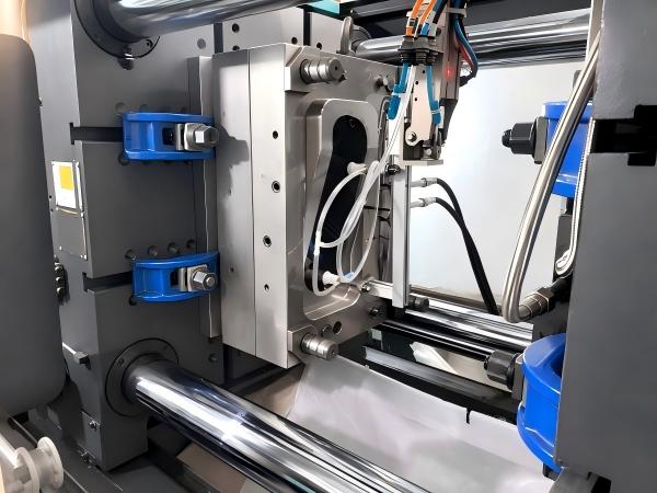 Injection mold installed in a press for a molded part trial