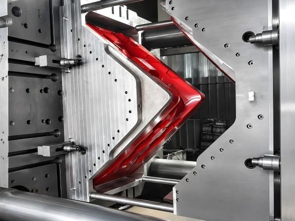 Injection mold opened in a press during a part trial