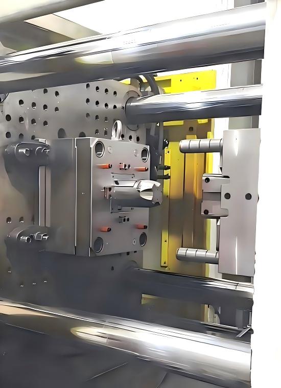 KTM mold in an injection molding press during a trial
